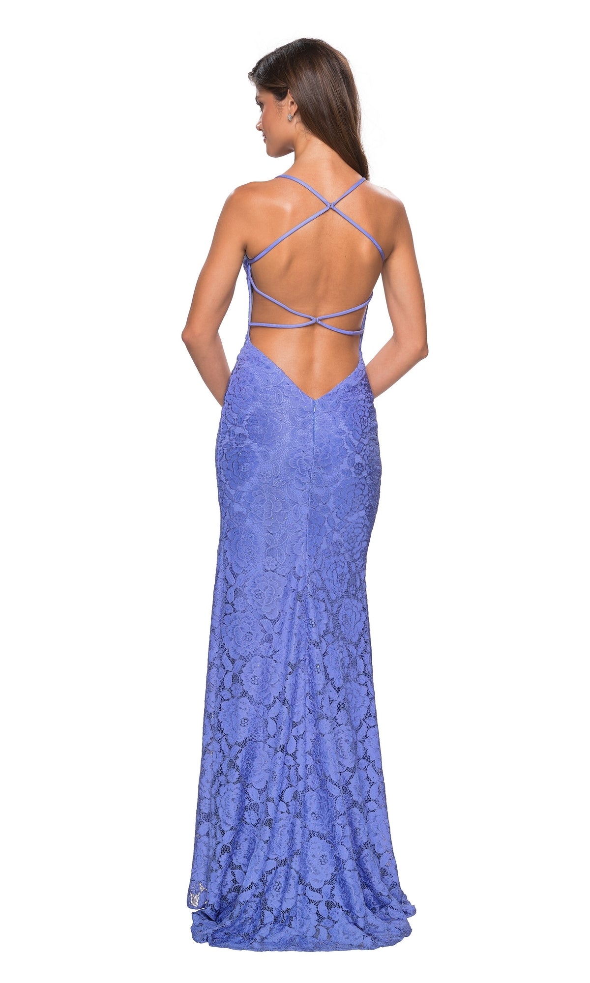 A woman faces away wearing La Femme 27614, a floor-length light purple backless prom dress with floral lace and crisscross spaghetti straps.